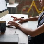 Business professional viewing digital information on a computer